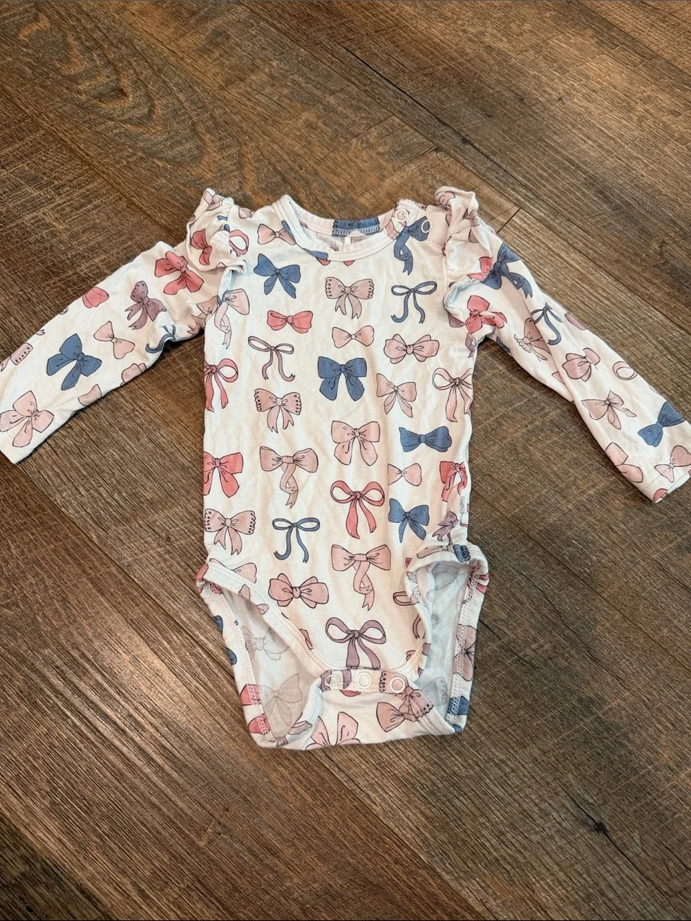 Posh Peanut Cream One-Piece Bodysuit with Pink & Blue Bows